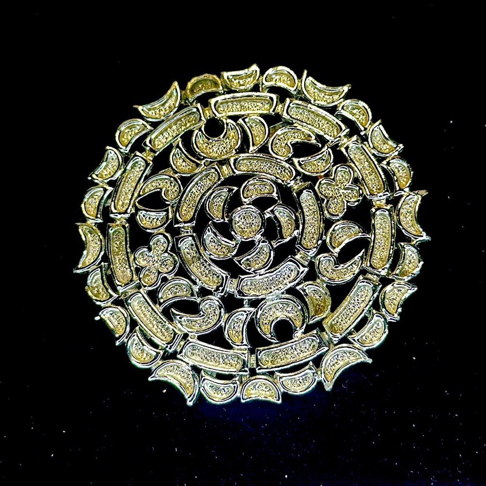 Medallion style silver brooch